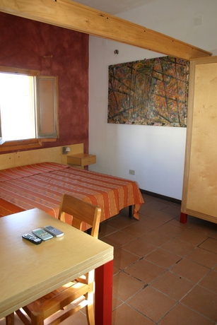 Imagen de la habitación del Hotel Il Cortiletto. Foto 4