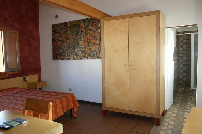 Imagen de la habitación del Hotel Il Cortiletto. Foto 5