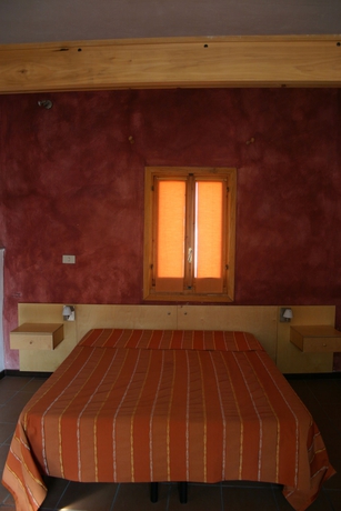 Imagen de la habitación del Hotel Il Cortiletto. Foto 6