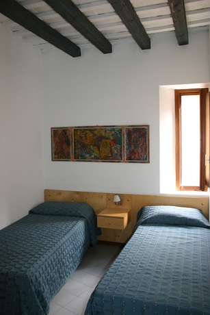 Imagen de la habitación del Hotel Il Cortiletto. Foto 8