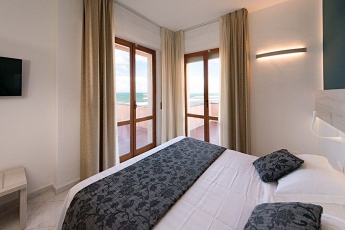 Imagen de la habitación del Hotel Il Delfino. Foto 5