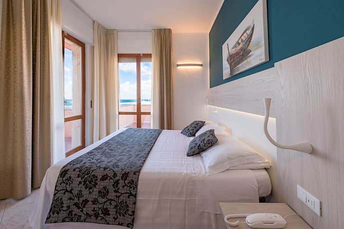 Imagen de la habitación del Hotel Il Delfino. Foto 7