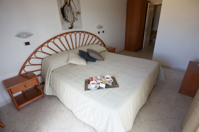Imagen de la habitación del Hotel Il Delfino. Foto 12