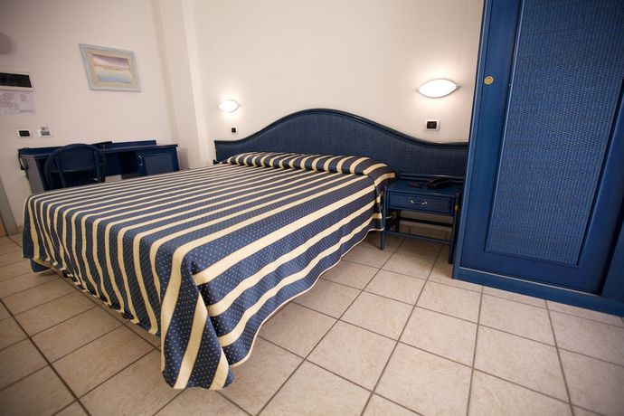 Imagen de la habitación del Hotel Il Delfino. Foto 14