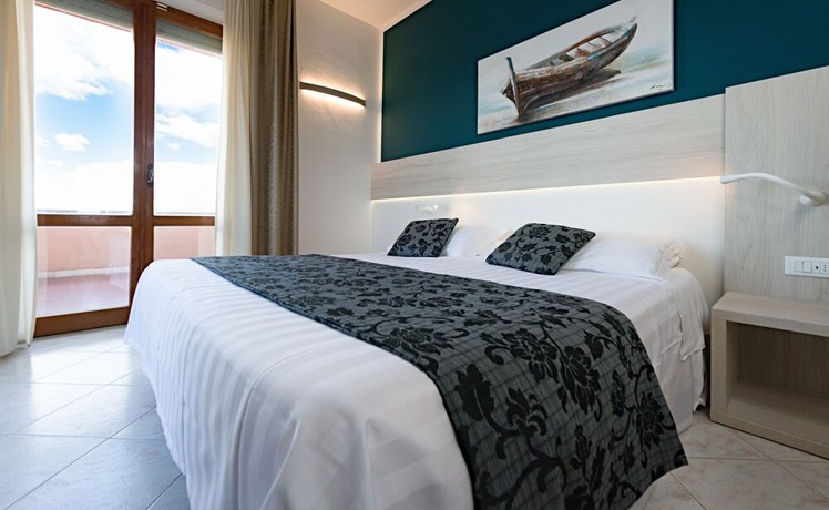 Imagen de la habitación del Hotel Il Delfino. Foto 17