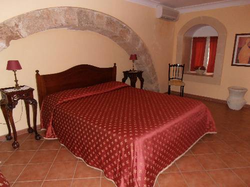 Imagen de la habitación del Hotel Il Duomo, Siracusa. Foto 11