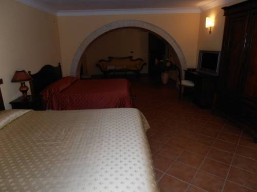 Imagen de la habitación del Hotel Il Duomo, Siracusa. Foto 16