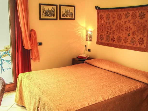 Imagen de la habitación del Hotel Il Faro Della Guitgia. Foto 11