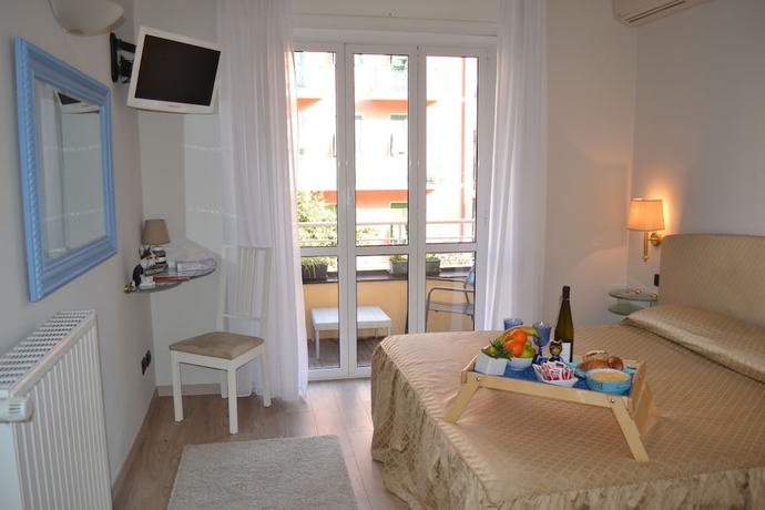 Imagen de la habitación del Hotel Il Gatto. Foto 4