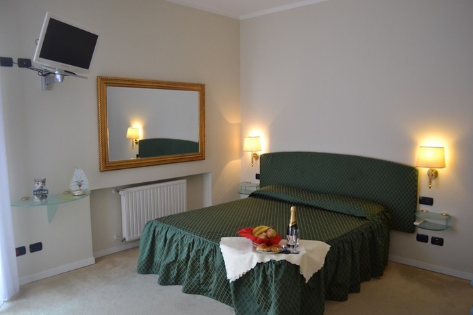 Imagen de la habitación del Hotel Il Gatto. Foto 12