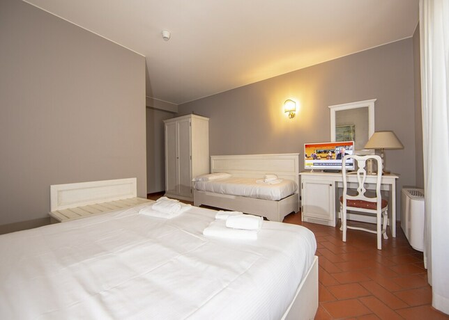 Imagen de la habitación del Hotel Il Gelso. Foto 17