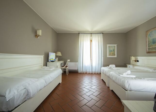 Imagen de la habitación del Hotel Il Gelso. Foto 19