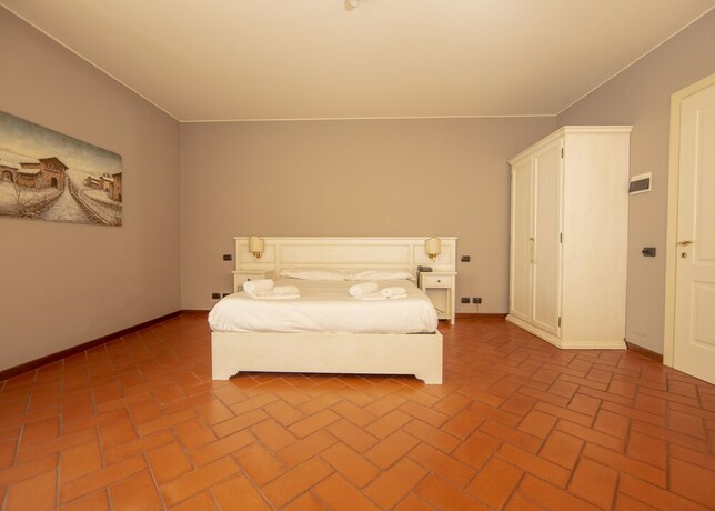 Imagen de la habitación del Hotel Il Gelso. Foto 25