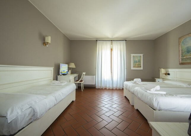 Imagen de la habitación del Hotel Il Gelso. Foto 26