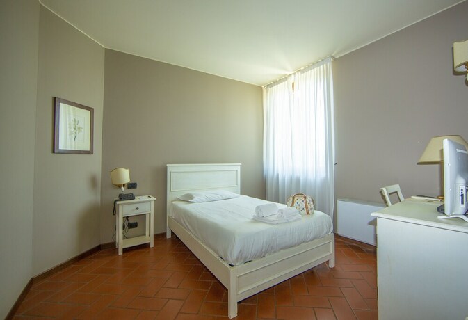 Imagen de la habitación del Hotel Il Gelso. Foto 30