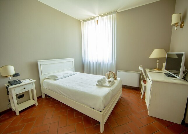 Imagen de la habitación del Hotel Il Gelso. Foto 31