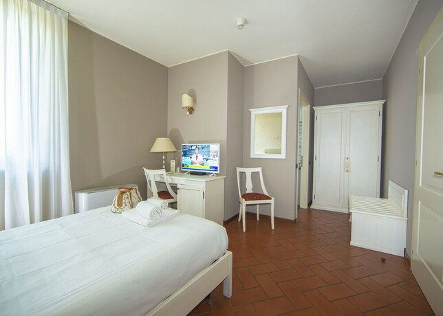 Imagen de la habitación del Hotel Il Gelso. Foto 32