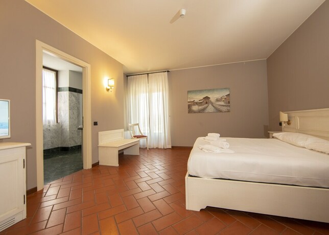 Imagen de la habitación del Hotel Il Gelso. Foto 33