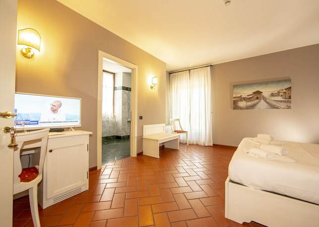 Imagen de la habitación del Hotel Il Gelso. Foto 34