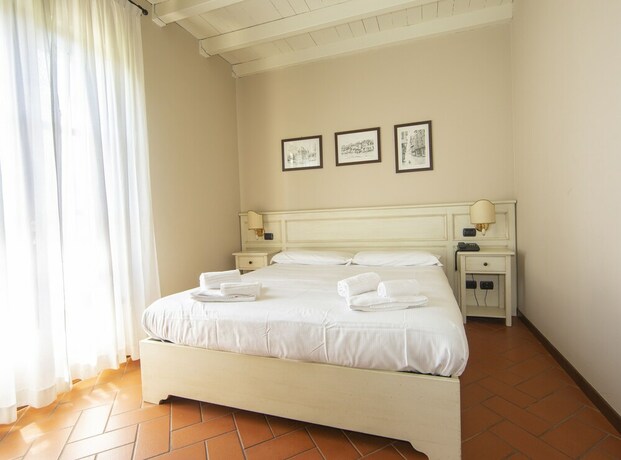 Imagen de la habitación del Hotel Il Gelso. Foto 35