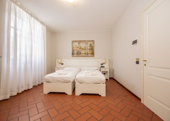 Imagen de la habitación del Hotel Il Gelso. Foto 39