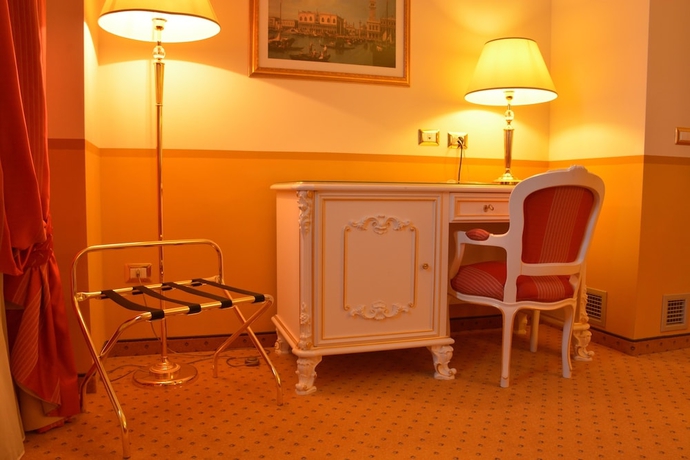 Imagen de la habitación del Hotel Il Gentiluomo. Foto 13