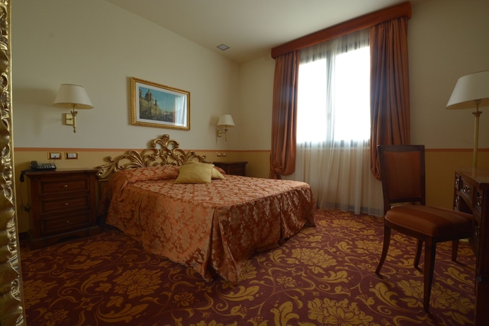 Imagen de la habitación del Hotel Il Gentiluomo. Foto 14