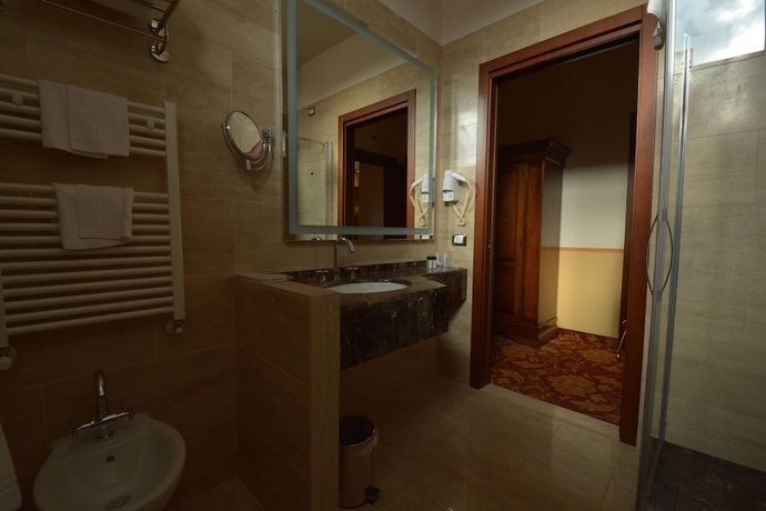 Imagen de la habitación del Hotel Il Gentiluomo. Foto 16