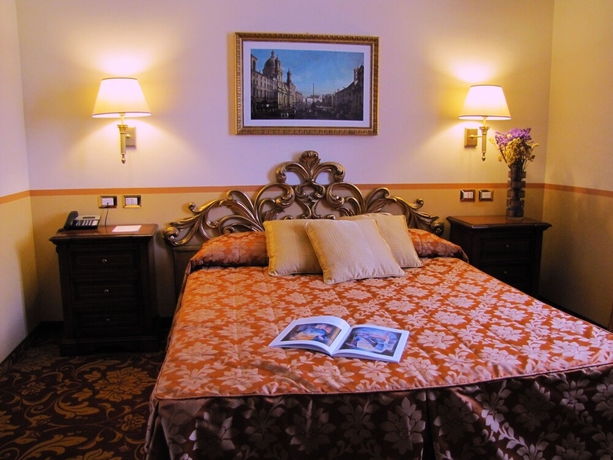 Imagen de la habitación del Hotel Il Gentiluomo. Foto 17