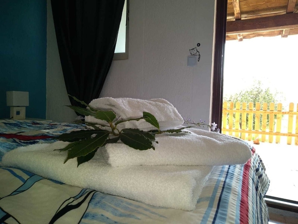 Imagen de la habitación del Hotel Il Giardino Degli Ulivi. Foto 7
