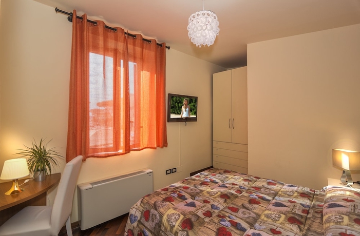 Imagen de la habitación del Hotel Il Giardino. Foto 16