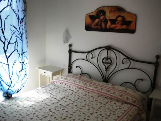 Imagen de la habitación del Hotel Il Girasole, Massignano. Foto 3