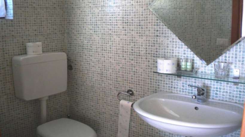 Imagen de la habitación del Hotel Il Girasole, Massignano. Foto 6