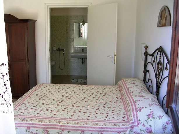 Imagen de la habitación del Hotel Il Girasole, Massignano. Foto 11