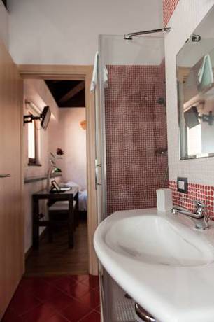Imagen de la habitación del Hotel Il Lavatoio Dimora Storica. Foto 7