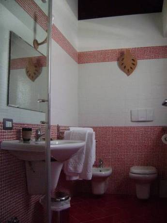 Imagen de la habitación del Hotel Il Lavatoio Dimora Storica. Foto 12