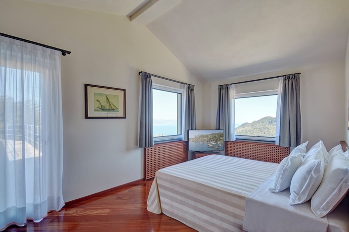 Imagen de la habitación del Hotel Il Leccio Luxury Resort. Foto 4