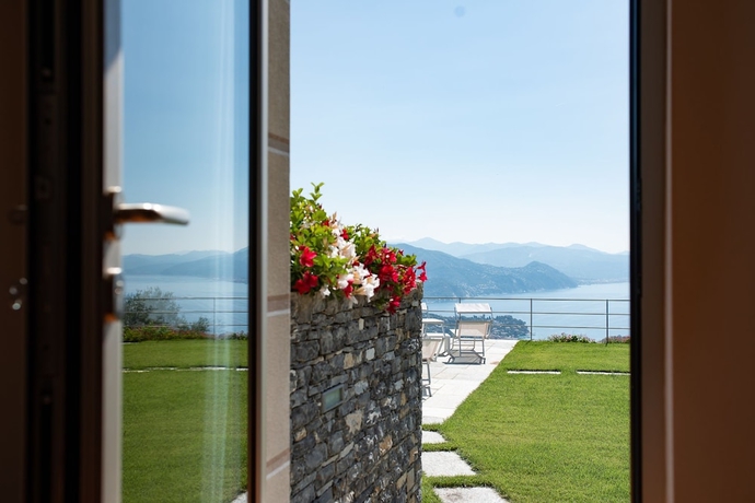 Imagen de la habitación del Hotel Il Leccio Luxury Resort. Foto 9