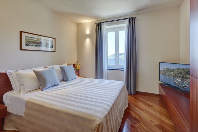 Imagen de la habitación del Hotel Il Leccio Luxury Resort. Foto 10