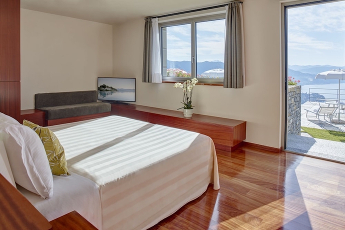 Imagen de la habitación del Hotel Il Leccio Luxury Resort. Foto 14
