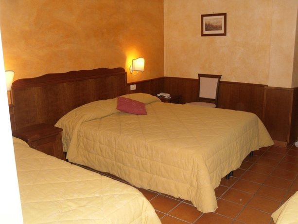 Imagen de la habitación del Hotel Il Maniero. Foto 7