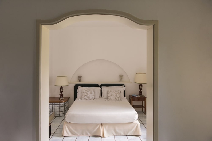 Imagen de la habitación del Hotel Il Melograno. Foto 8