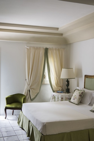 Imagen de la habitación del Hotel Il Melograno. Foto 15