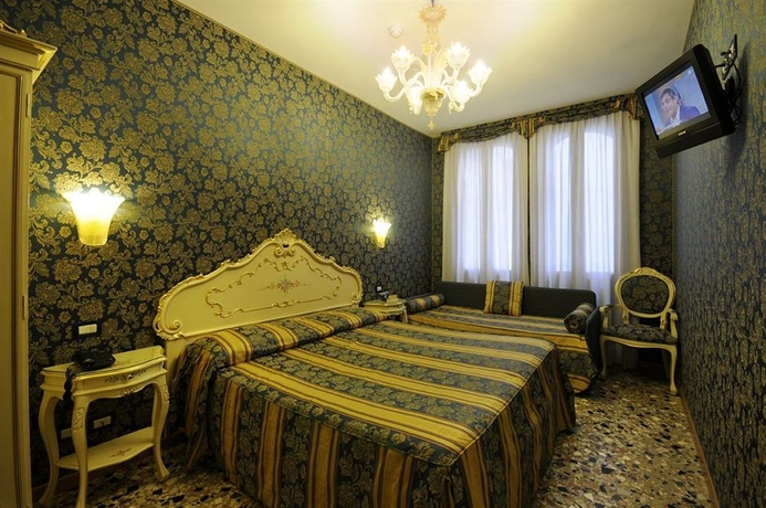 Imagen de la habitación del Hotel Il Mercante Di Venezia. Foto 5