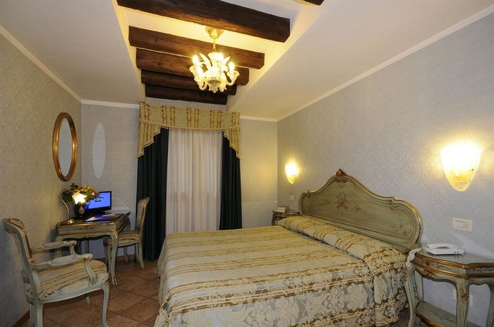 Imagen de la habitación del Hotel Il Mercante Di Venezia. Foto 6