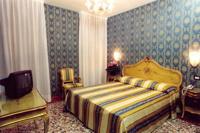 Imagen de la habitación del Hotel Il Mercante Di Venezia. Foto 8