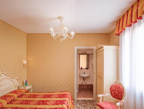 Imagen de la habitación del Hotel Il Mercante Di Venezia. Foto 22