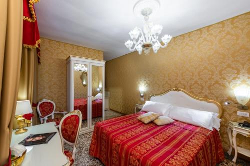 Imagen de la habitación del Hotel Il Mercante Di Venezia. Foto 26