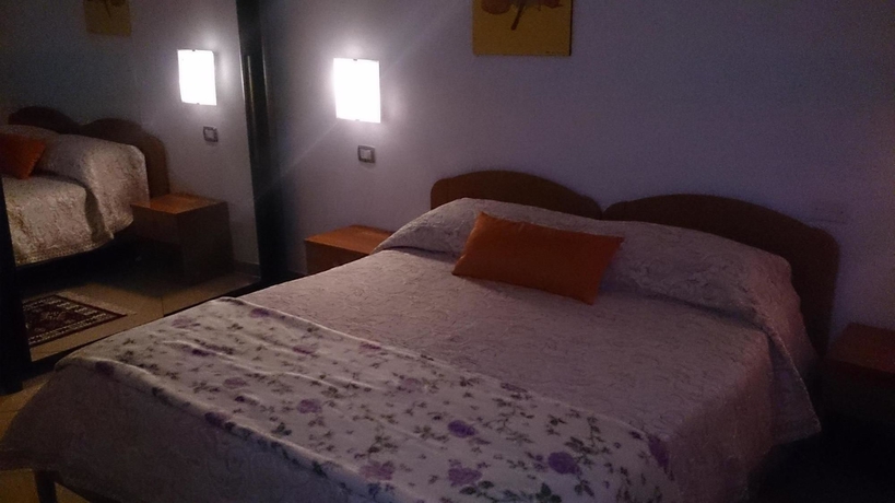 Imagen de la habitación del Hotel Il Mirto E La Rosa es. Foto 1