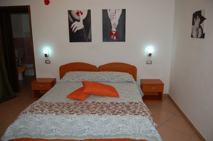 Imagen de la habitación del Hotel Il Mirto E La Rosa es. Foto 3